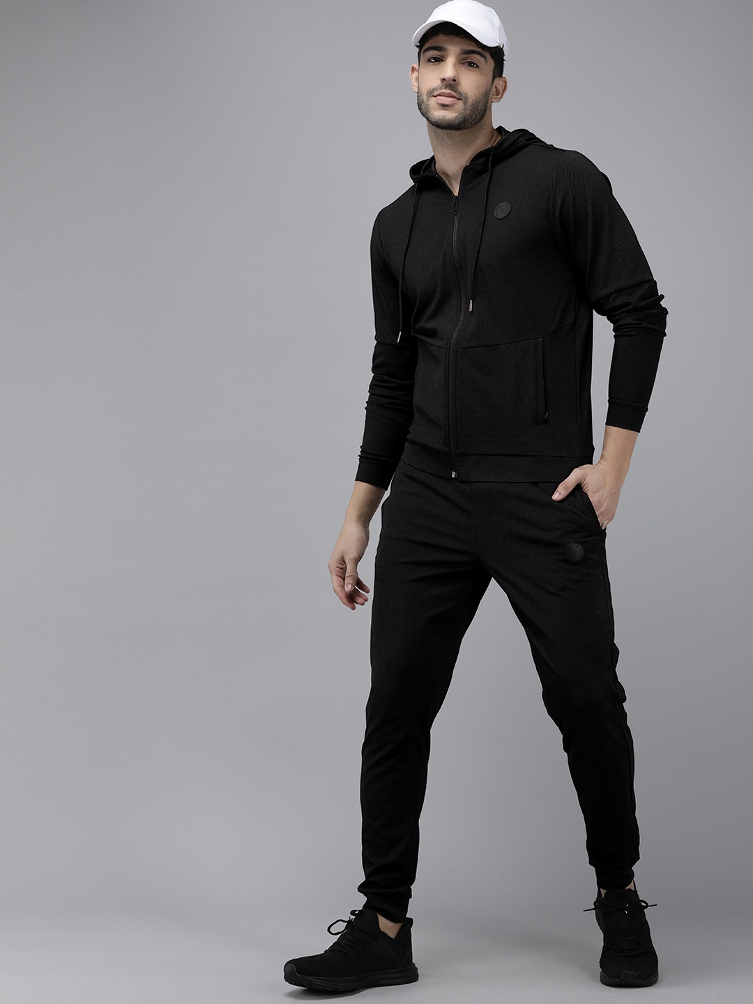 

Van Heusen Flex Men Printed Sports Tracksuit, Black