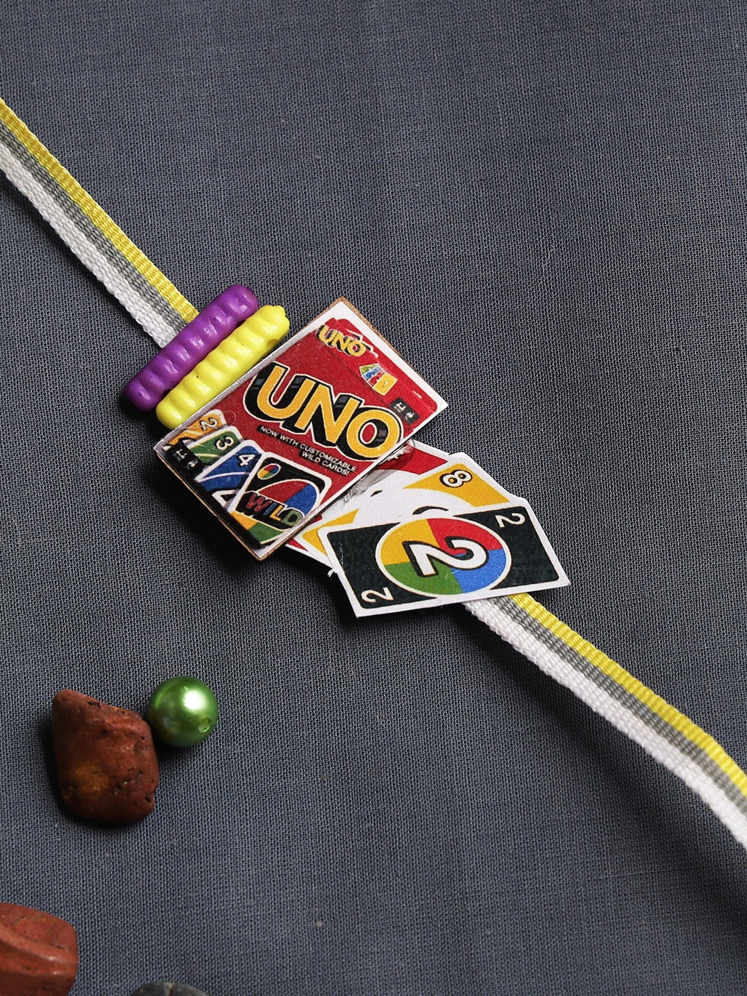 

Aapno Rajasthan Kids Uno Cards Printed Rakhi, Red