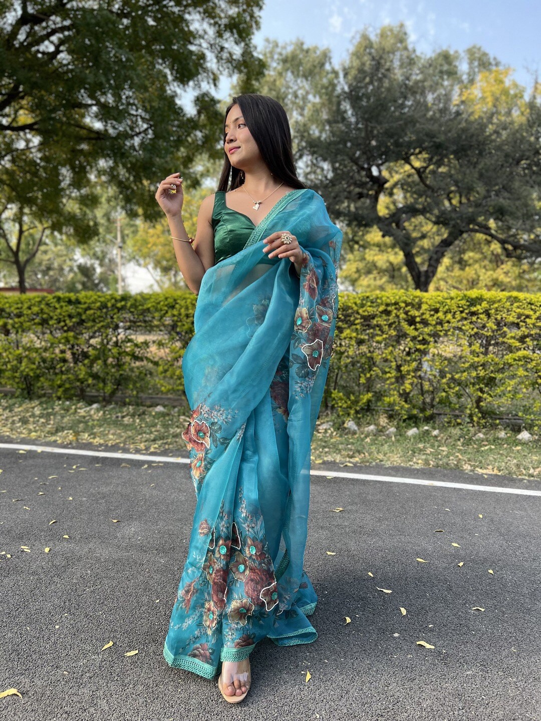 

Atulyam Tex World Floral Printed Embroidered Organza Saree, Blue