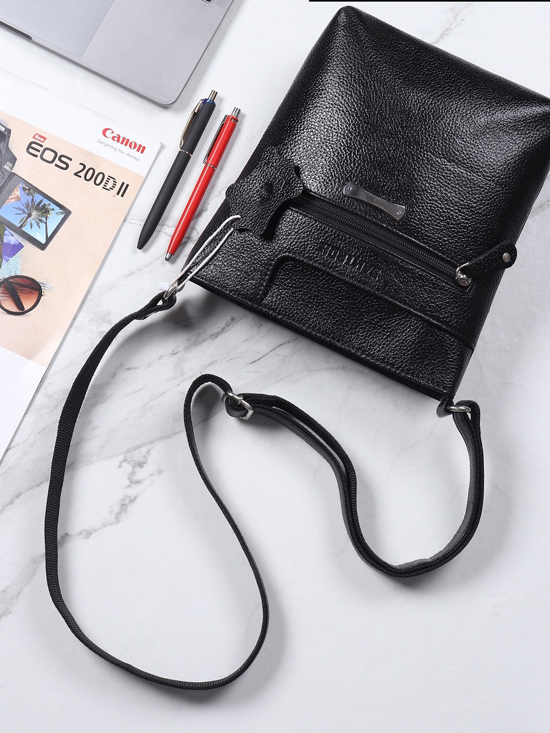 

SAMTROH Textured Structured Leather Sling Bag, Black