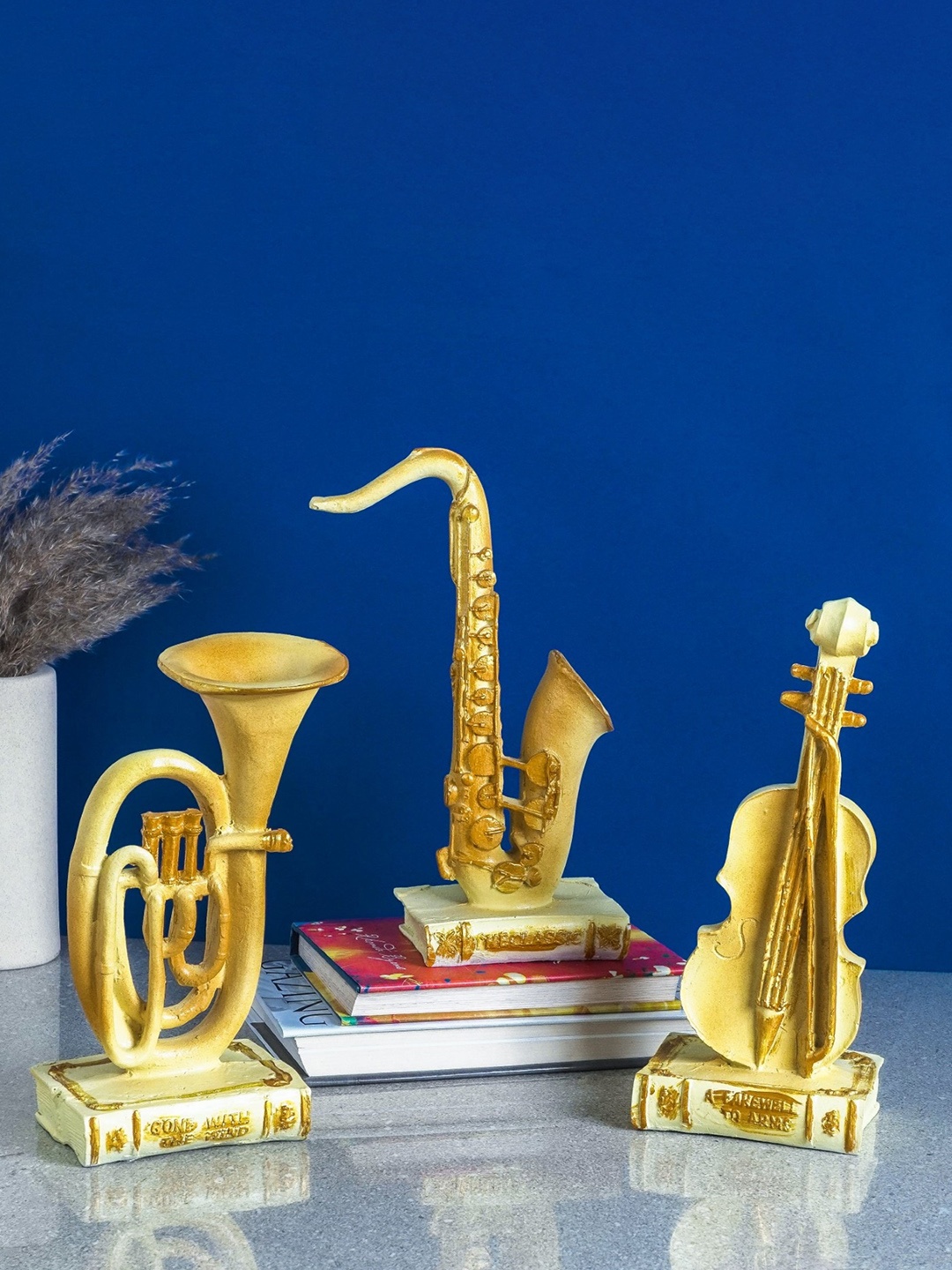 

The Decor Mart Gold Toned 3 Pieces Musical Instruments Table Decor Showpiece