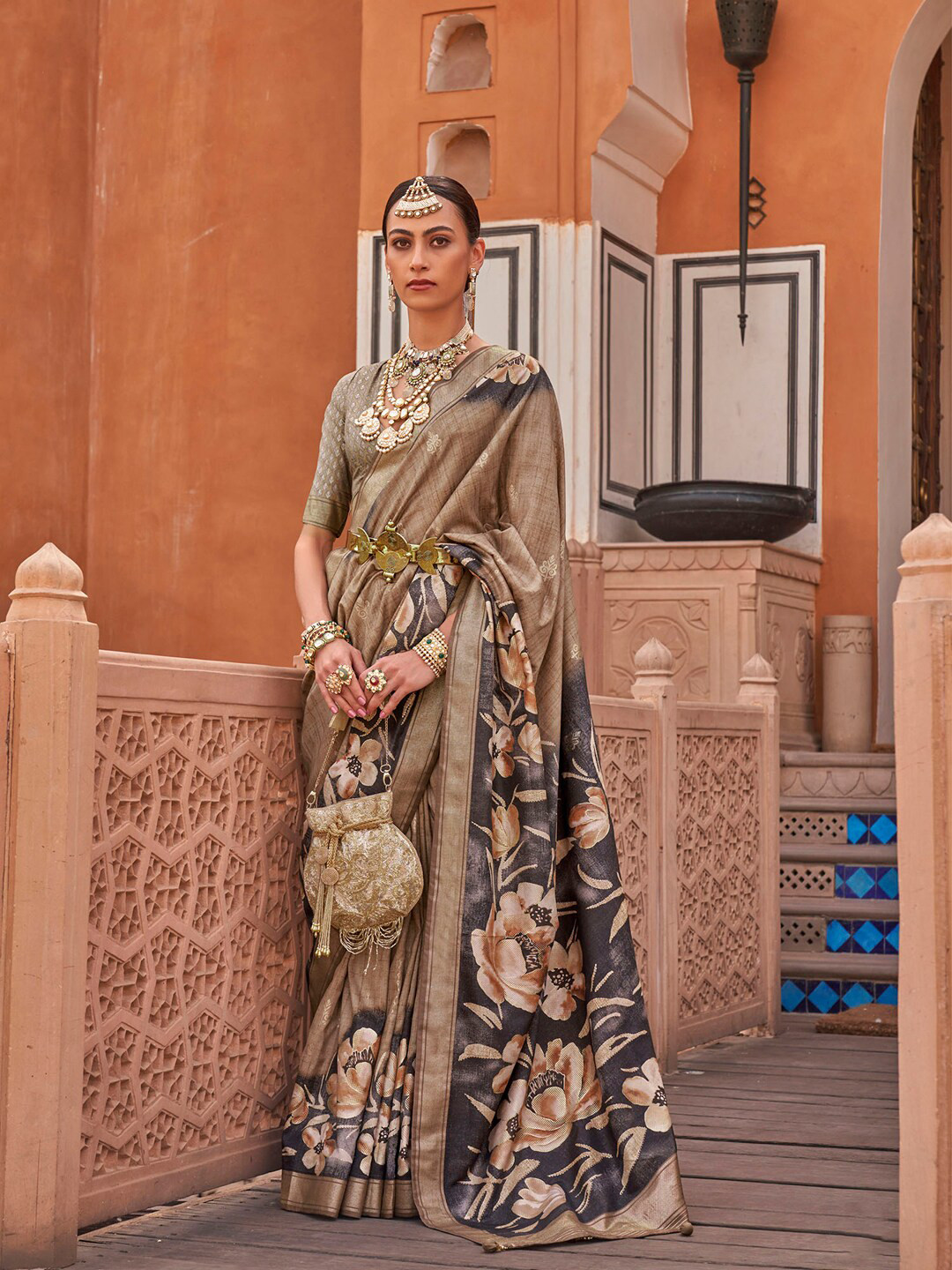 

Anouk Brown & Black Floral Woven Design Zari Saree