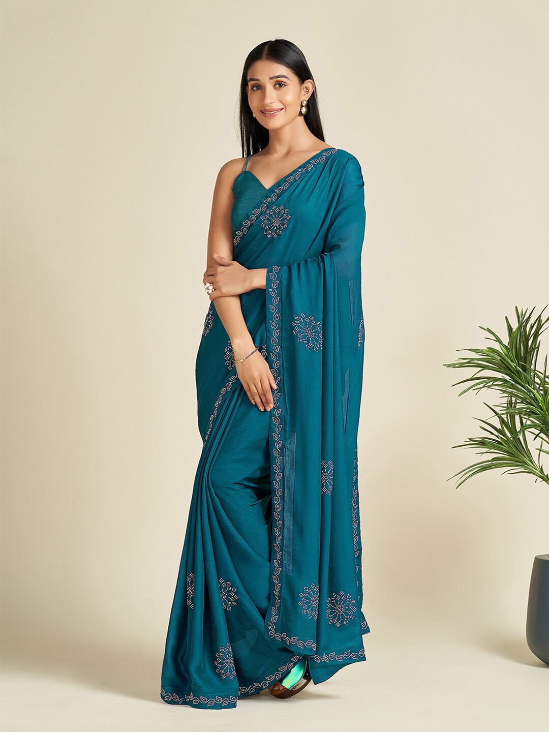 

Saree mall Teal Blue & Silver-Toned Embellished Stone Work Satin Sarees