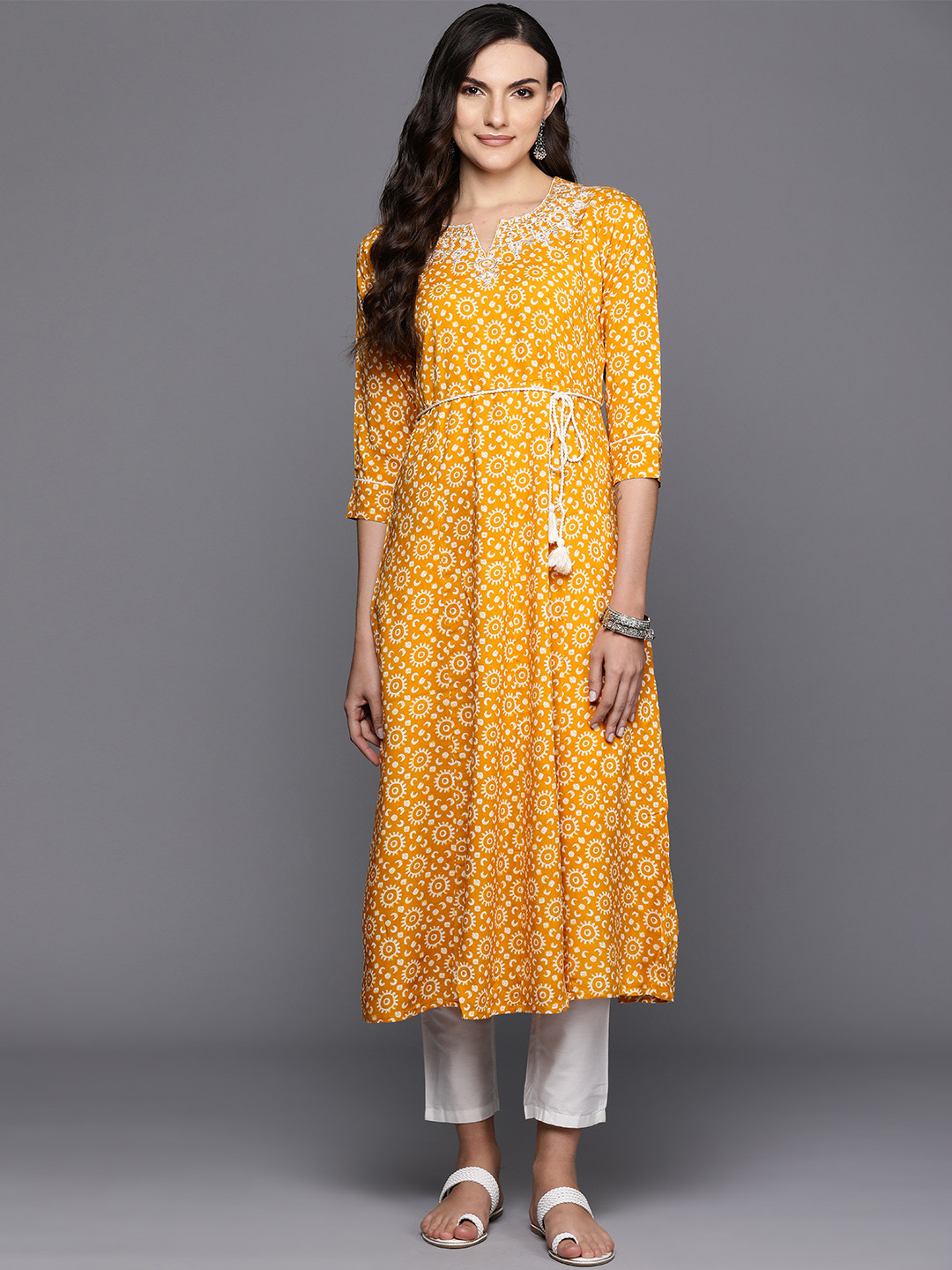 

Indo Era Ethnic Motifs Printed Mirror Work & Embroidered Detail A-Line Kurta with Belt, Yellow