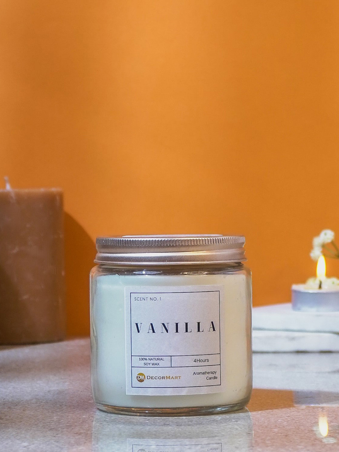 

The Decor Mart White Vanilla Scented Candle Jar With Lid