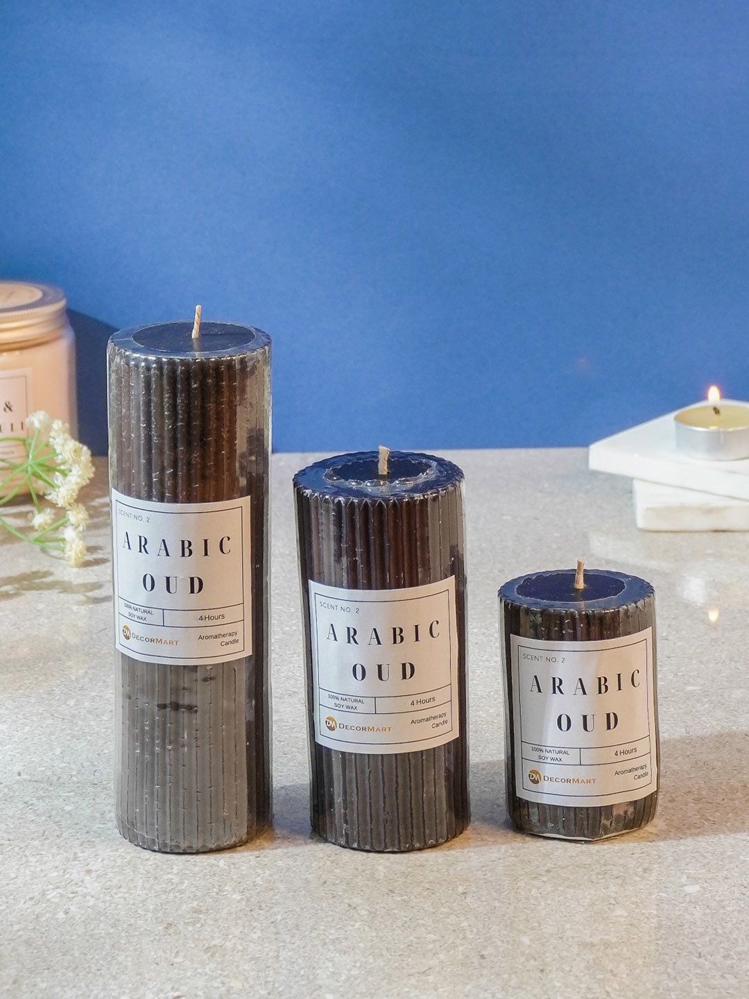 

The Decor Mart Grey 3 Pieces Oud Scented Pillar Candles
