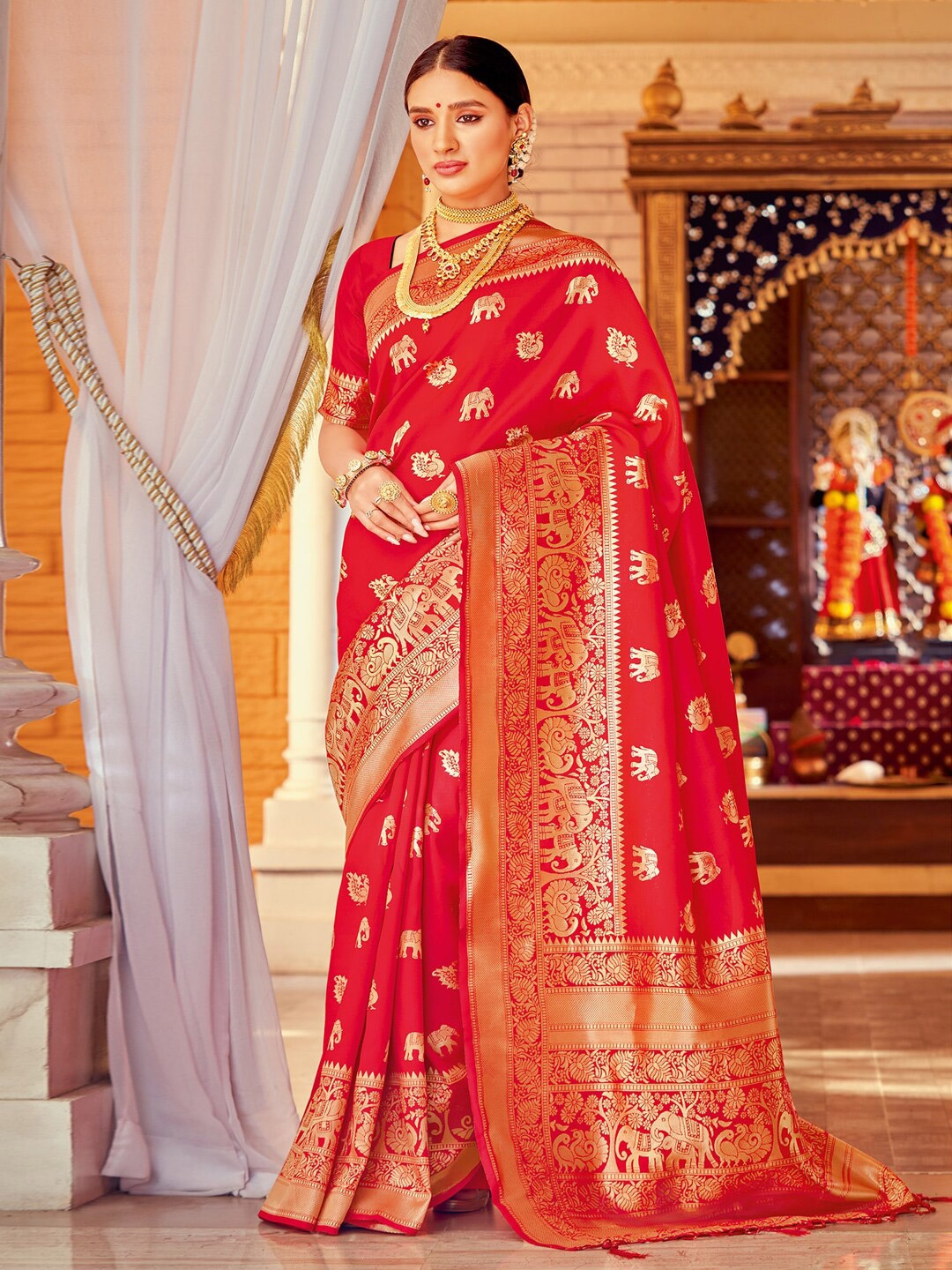 

Mitera Red & Gold-Toned Ethnic Motif Woven Design Zari Banarasi Saree