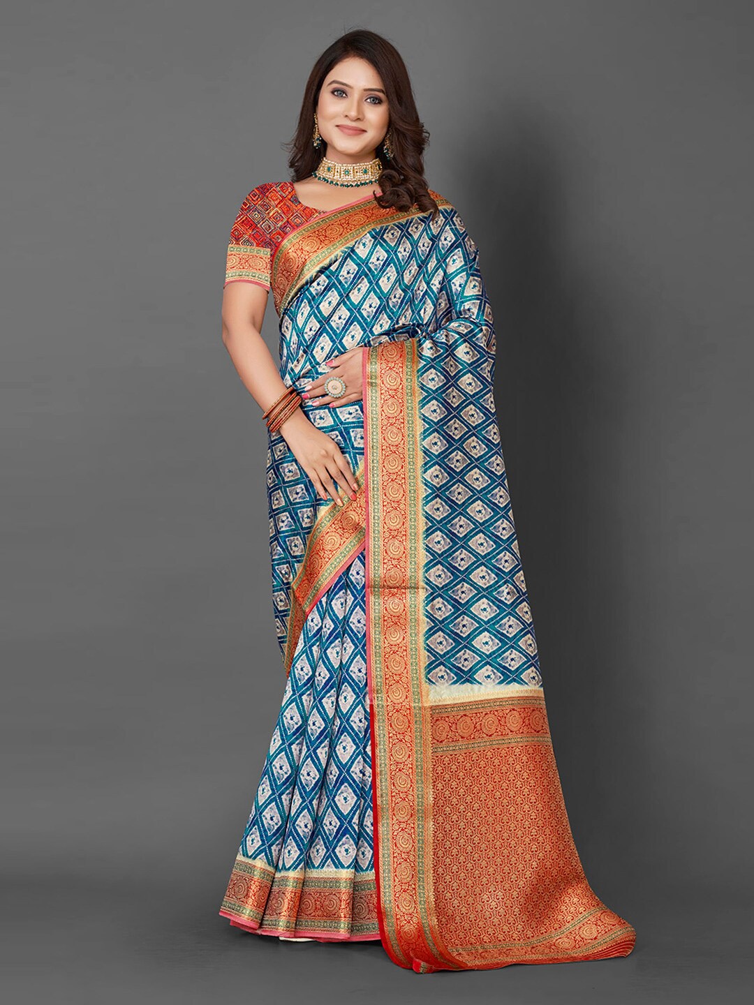 

Mitera Blue & Orange Ethnic Motif Woven Design Zari Banarasi Saree