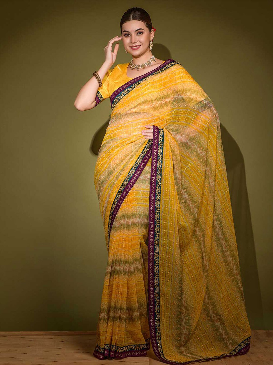 

ODETTE Abstract Printed Embellished Saree, Yellow
