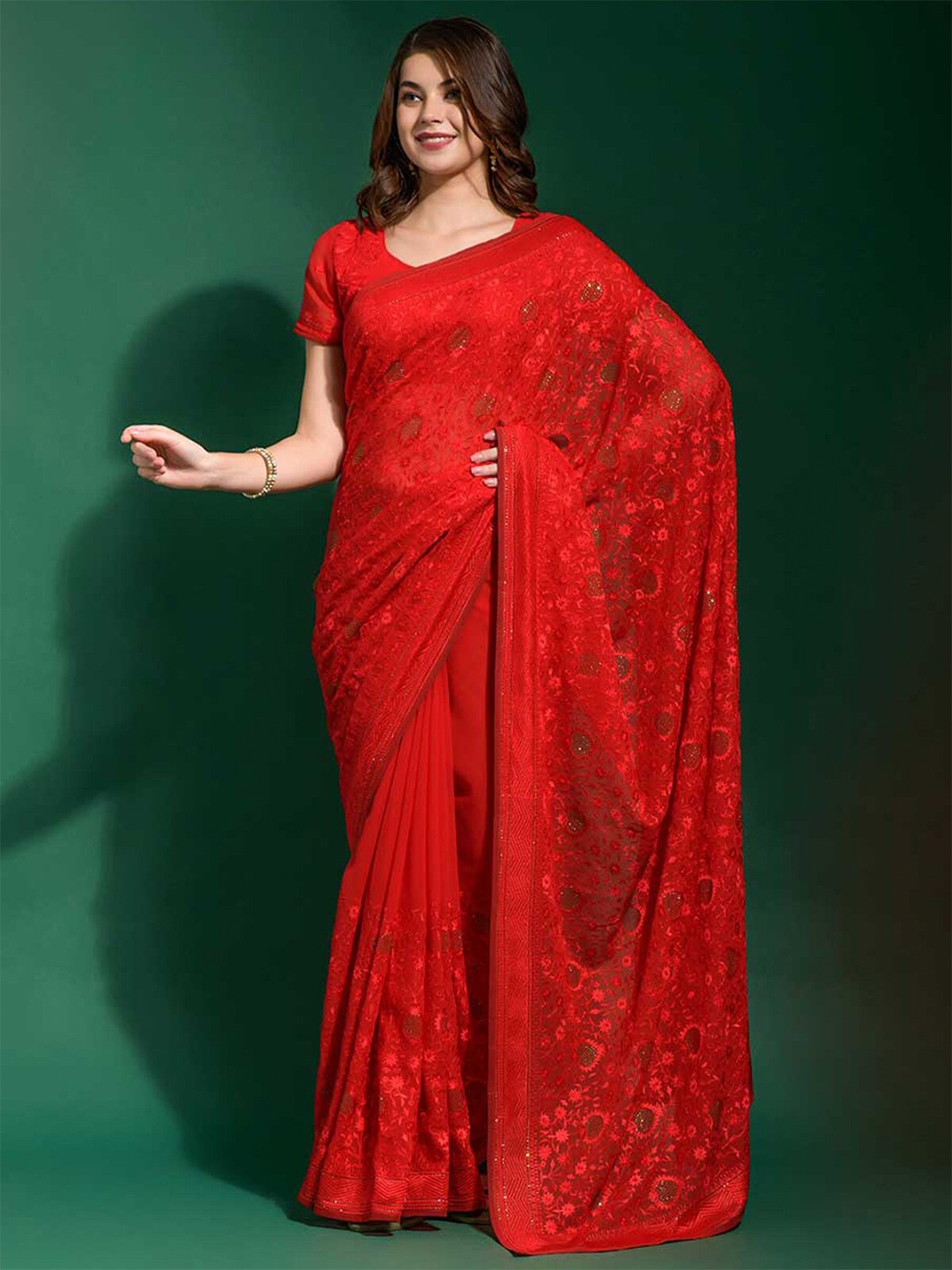 

ODETTE Orange Ethnic Motifs Embroidered Poly Georgette Saree