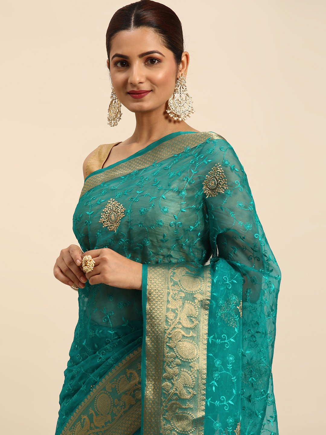 

Indian Women Turquoise Blue & Gold-Toned Floral Embroidered Organza Designer Saree