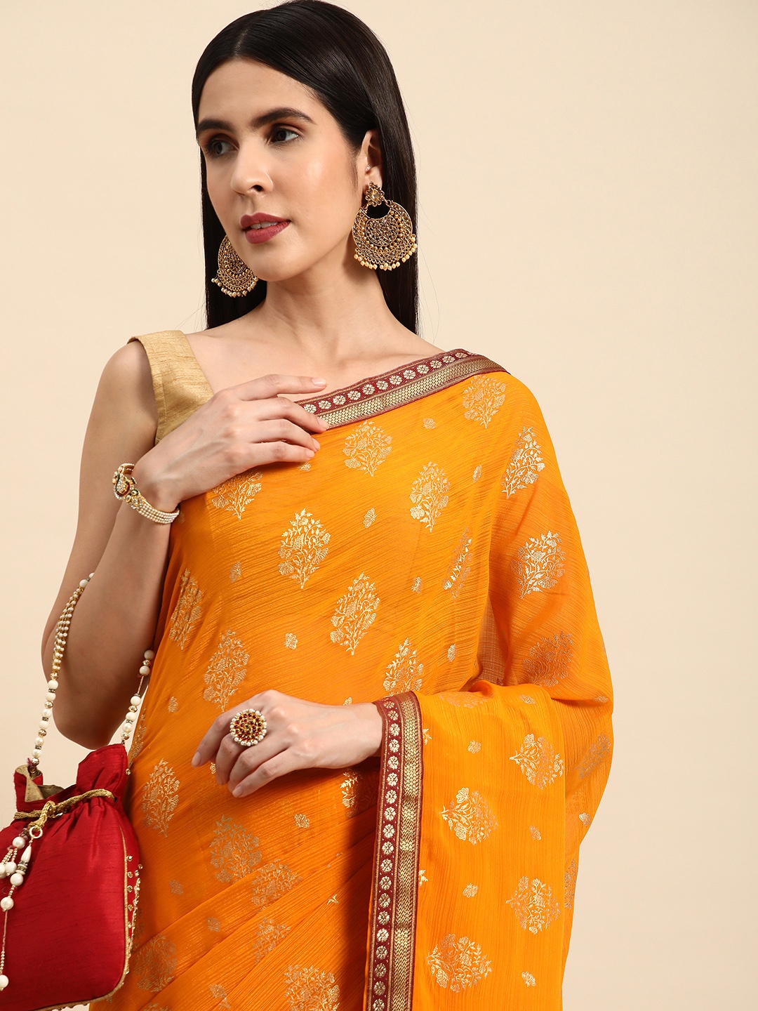 

Indian Women Ethnic Motifs Zari Silk Blend Saree, Yellow