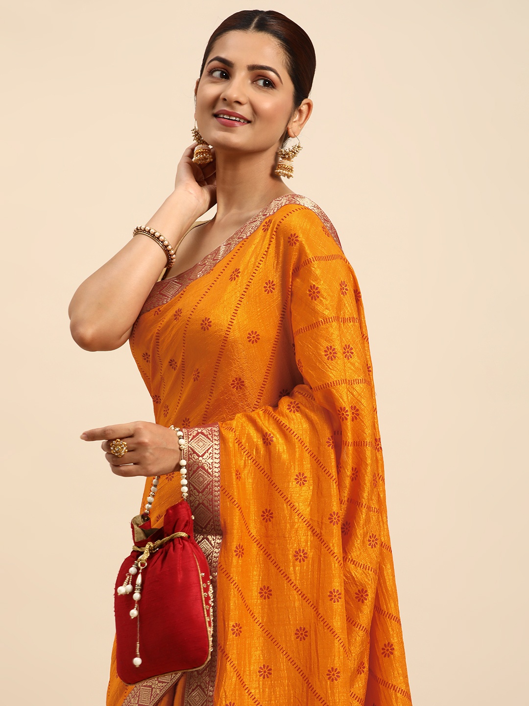 

Indian Women Mustard & Red Ethnic Motifs Silk Blend Designer Saree