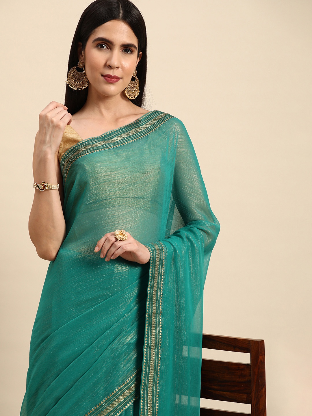 

Indian Women Solid Poly Georgette Saree, Green