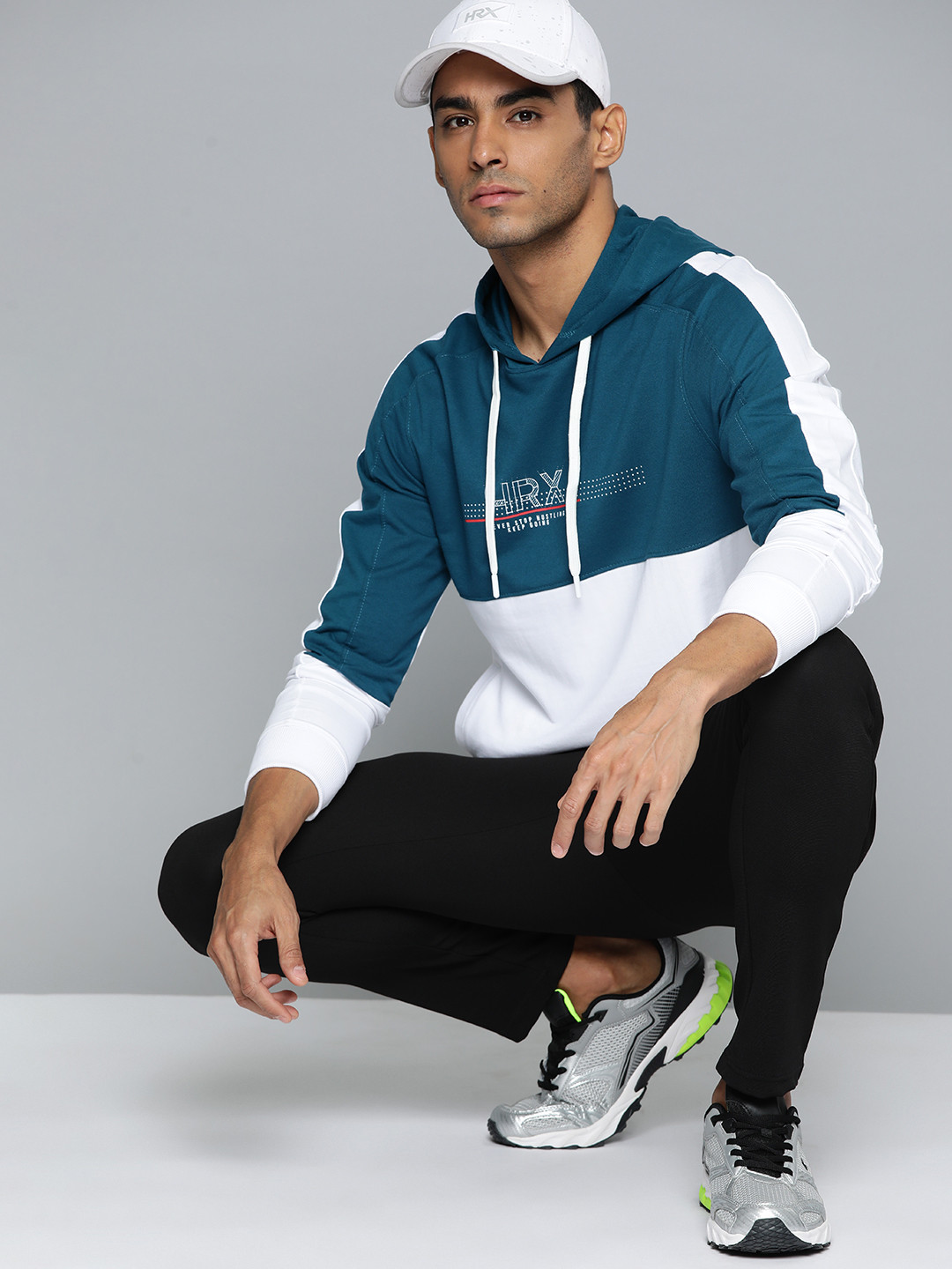 

HRX by Hrithik Roshan Men White Colourblocked Hooded Sweatshirt