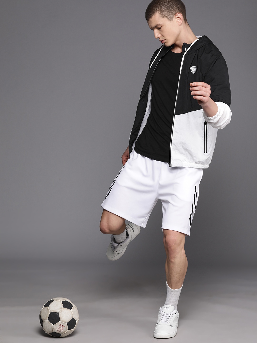

HRX by Hrithik Roshan Colourblocked Hooded Football Sports Jacket, Black