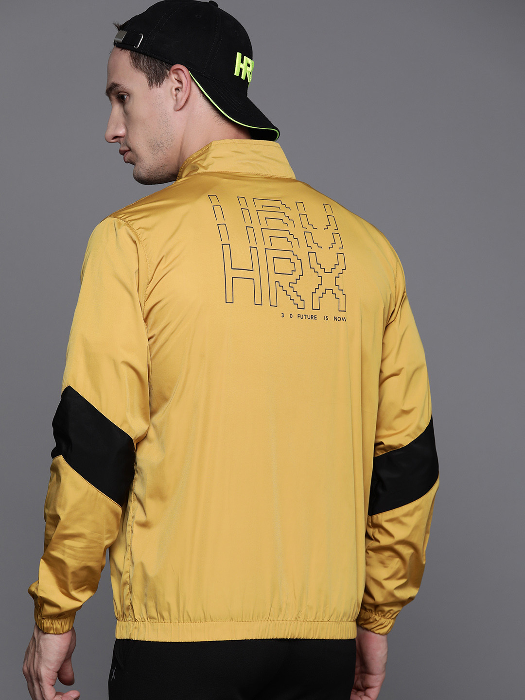

HRX by Hrithik Roshan Solid Lifestyle Bomber Jacket, Mustard