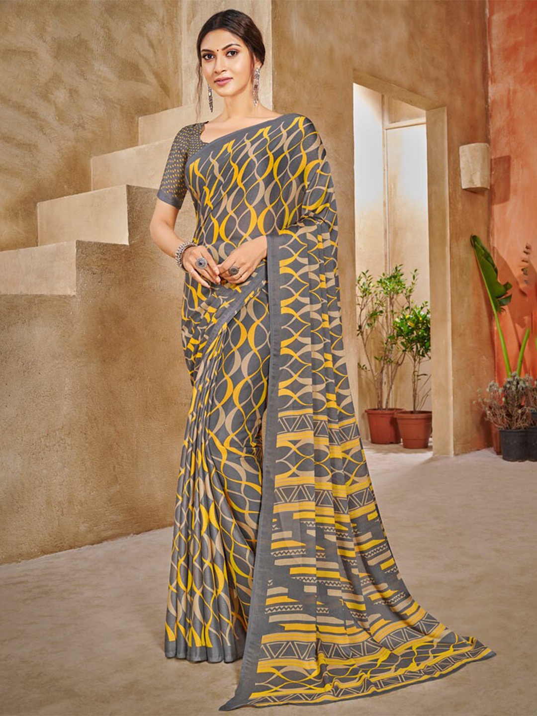 

Vishal Prints Ethnic Motifs Printed Poly Crepe Saree, Grey