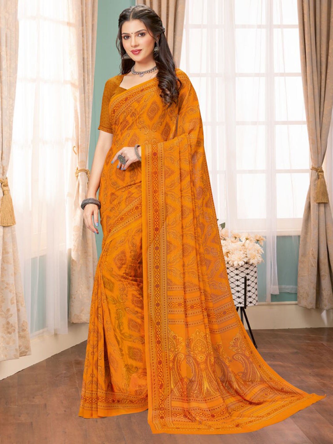 

Vishal Prints Ethnic Motifs Printed Saree, Gold