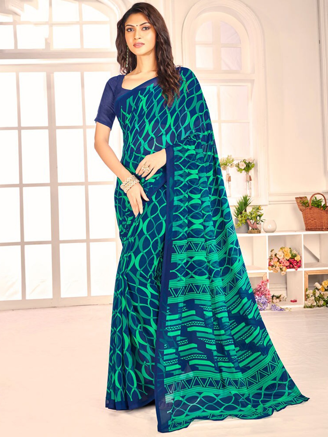 

Vishal Prints Abstract Printed Poly Georgette Saree, Blue