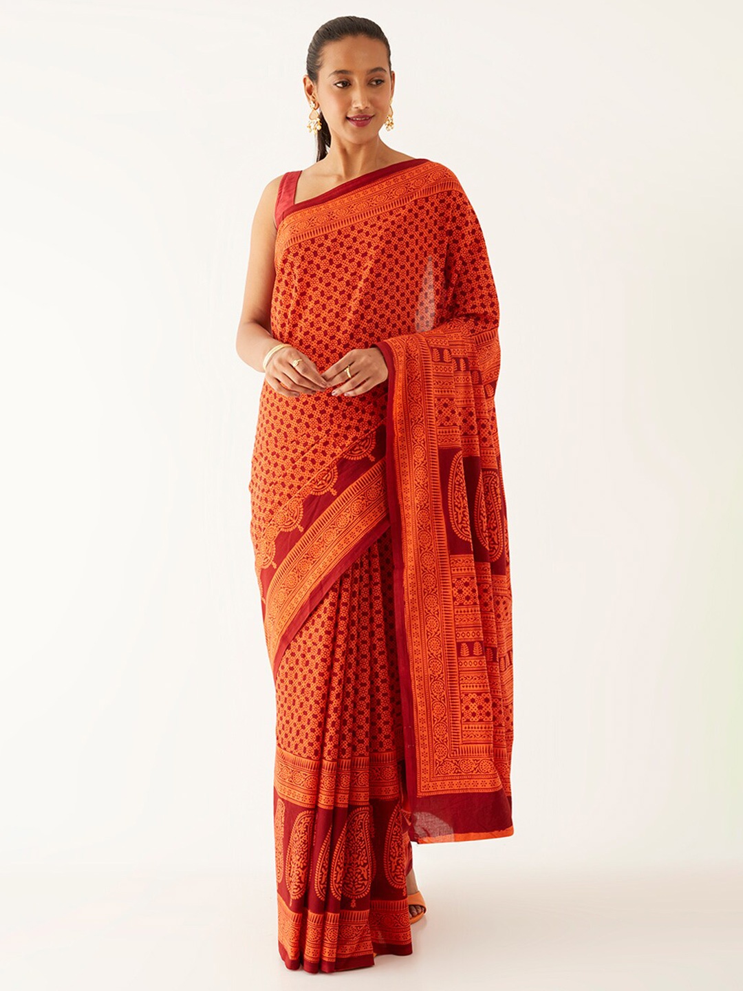 

Taneira Orange Ethnic Motifs Printed Pure Cotton Bagh Saree