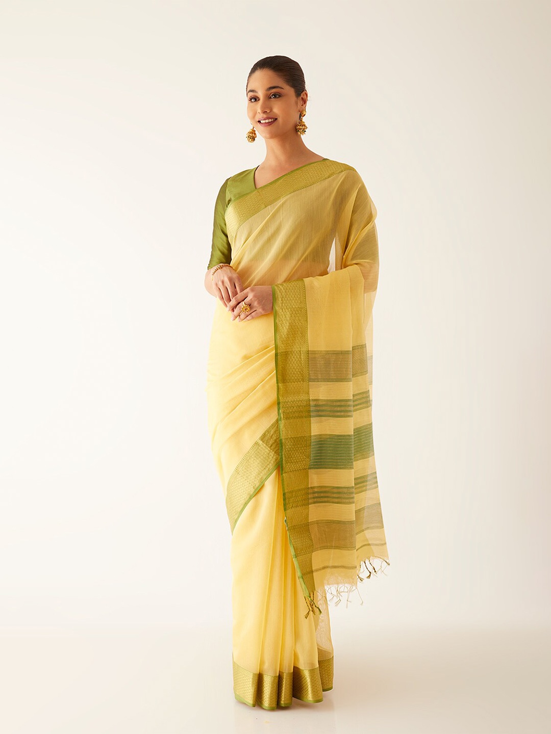 

Taneira Yellow & Green Zari Silk Cotton Maheshwari Saree