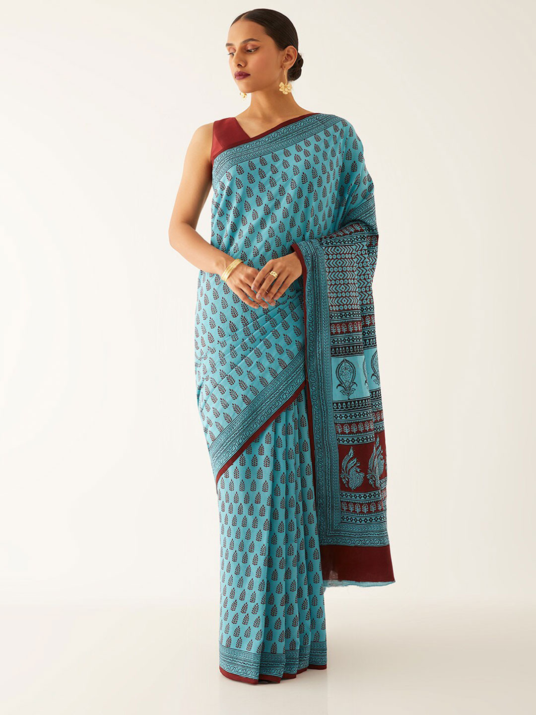 

Taneira Blue & Brown Bagh Printed Pure Cotton Saree