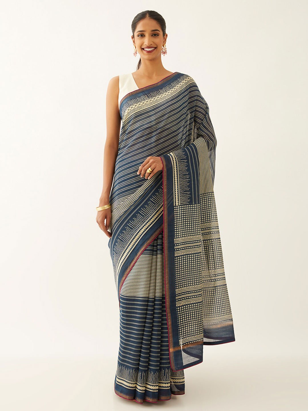 

Taneira Striped Zari Silk Cotton Bagru Saree, Blue