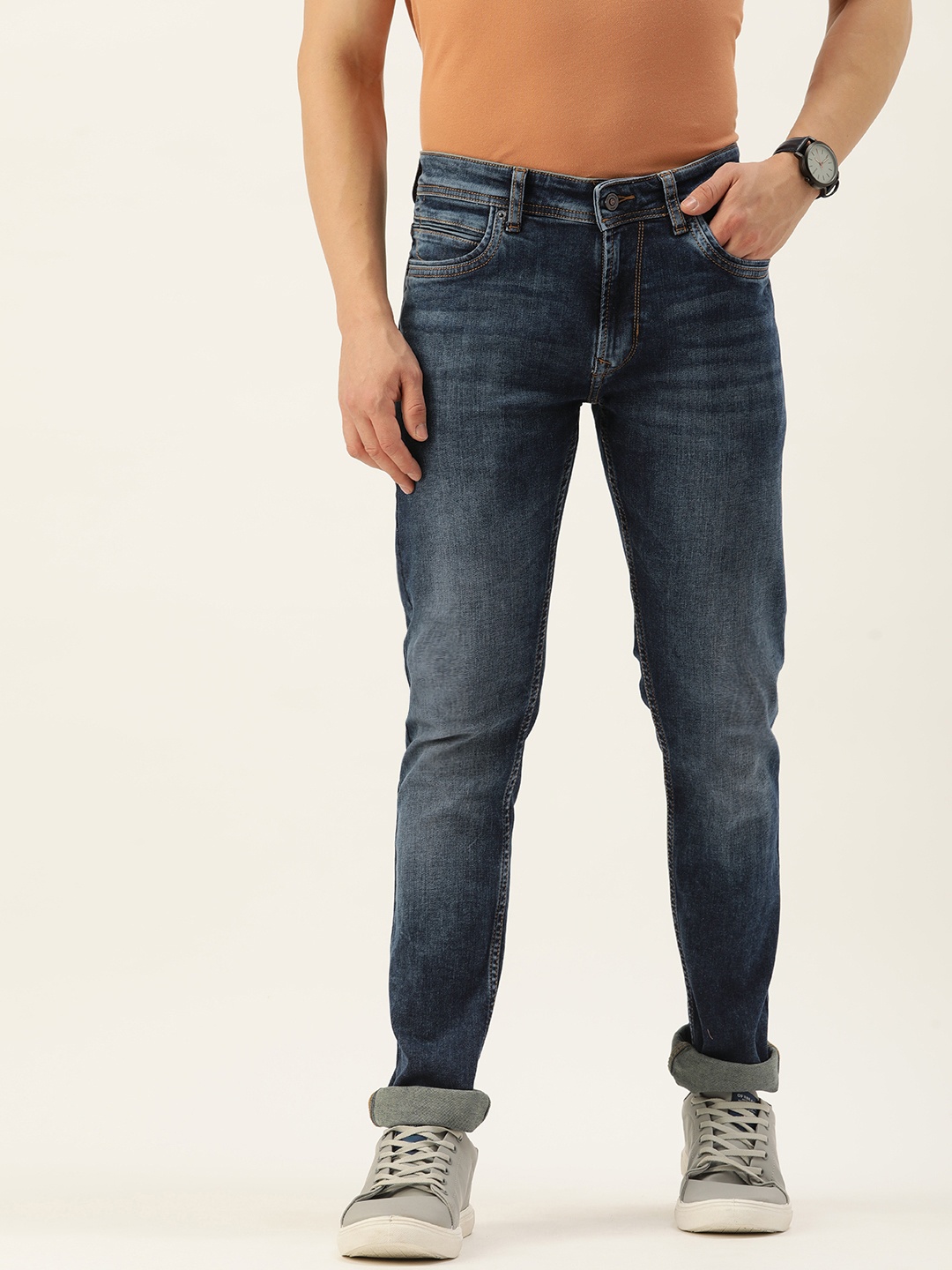 

Peter England Casuals Men Slim Fit Heavy Fade Stretchable Mid-Rise Jeans, Blue