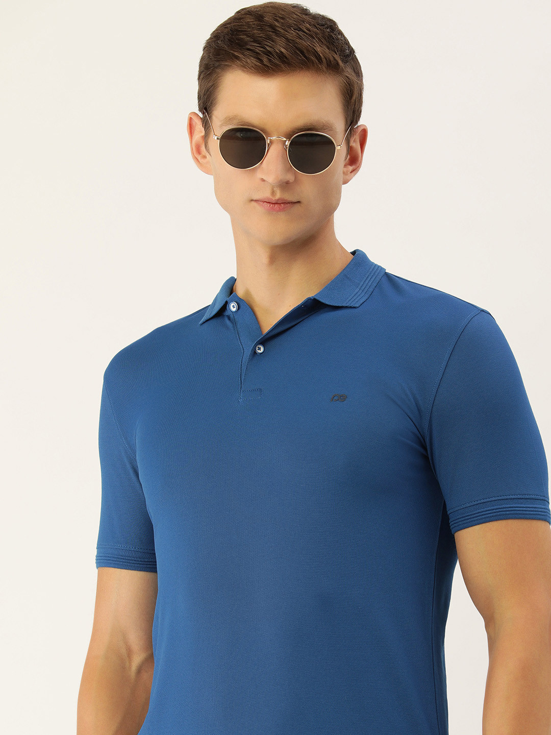 

Peter England Men Solid Polo Collar Slim Fit T-shirt, Navy blue