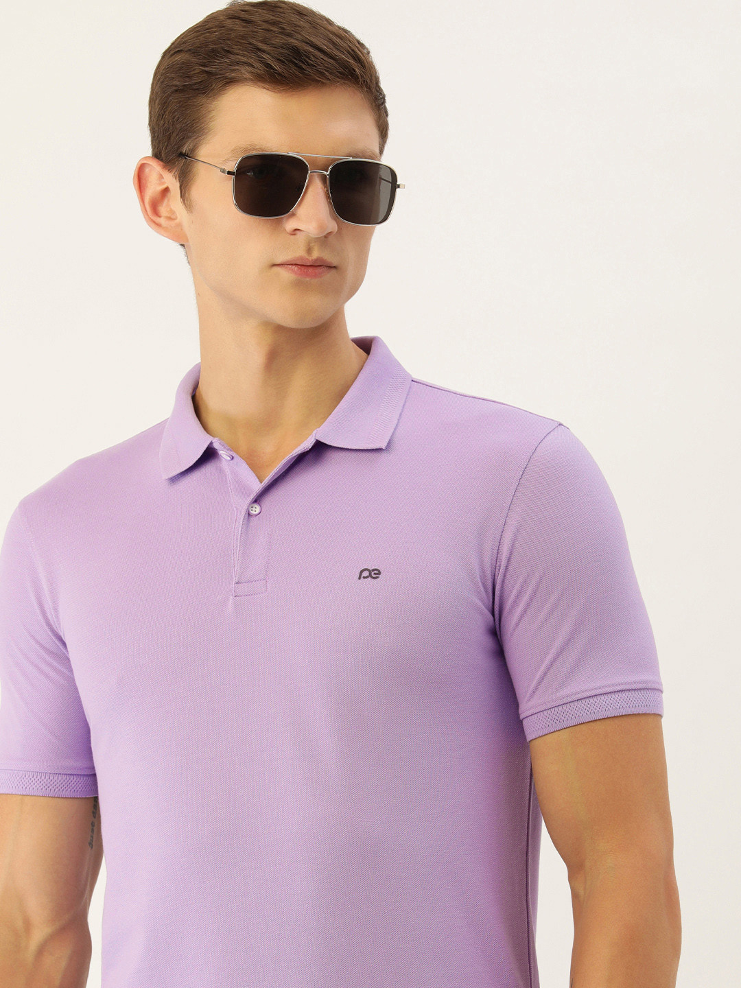 

Peter England Men Solid Polo Collar Slim Fit T-shirt, Lavender