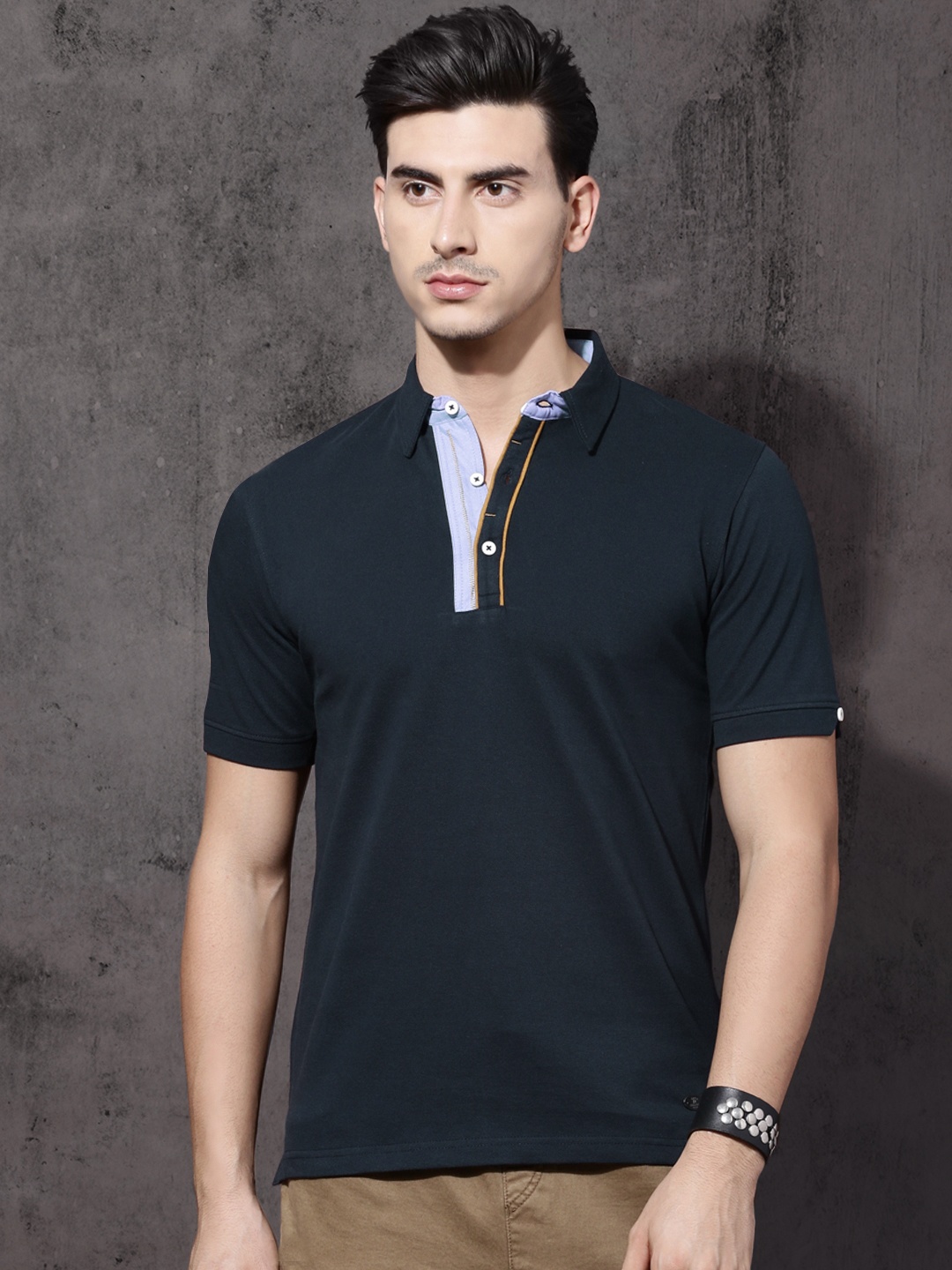 

Roadster Men Navy Solid Polo Collar T-shirt, Navy blue