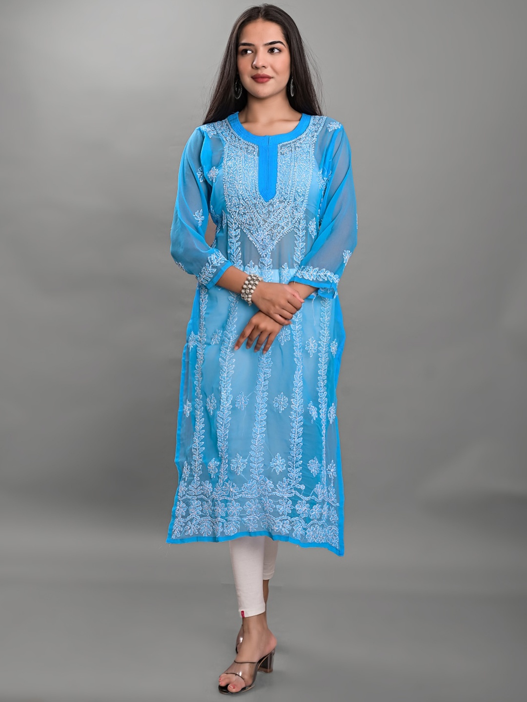 

Apratim Ethnic Motifs Embroidered Chikankari Semi Sheer Georgette Kurta, Turquoise blue
