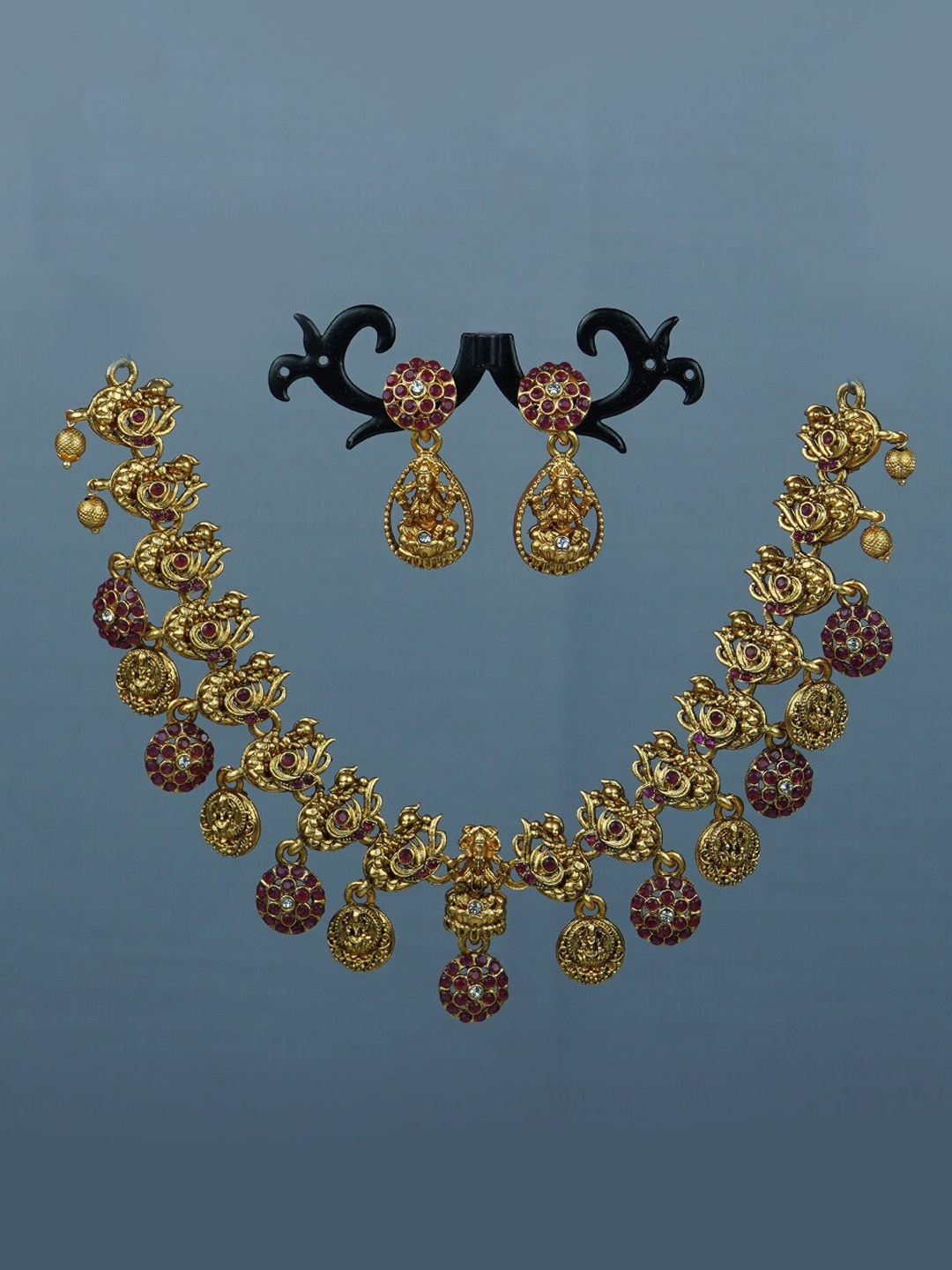 

Diksha collection Gold-Plated Stone Studded Jewellery Set, Maroon