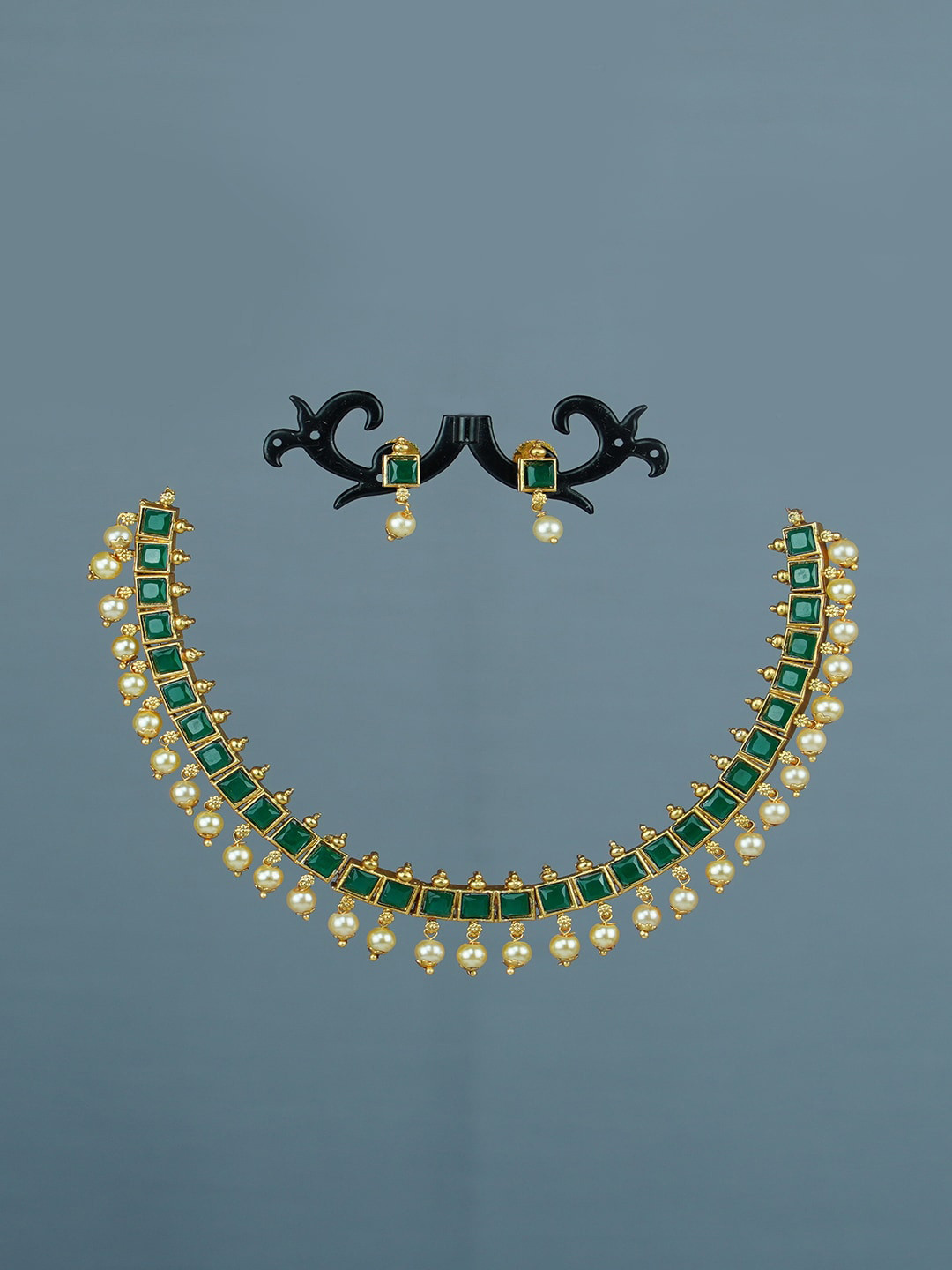 

Diksha collection Gold-Plated Stone-Studded & Beaded Matte Finish Jewellery Set
