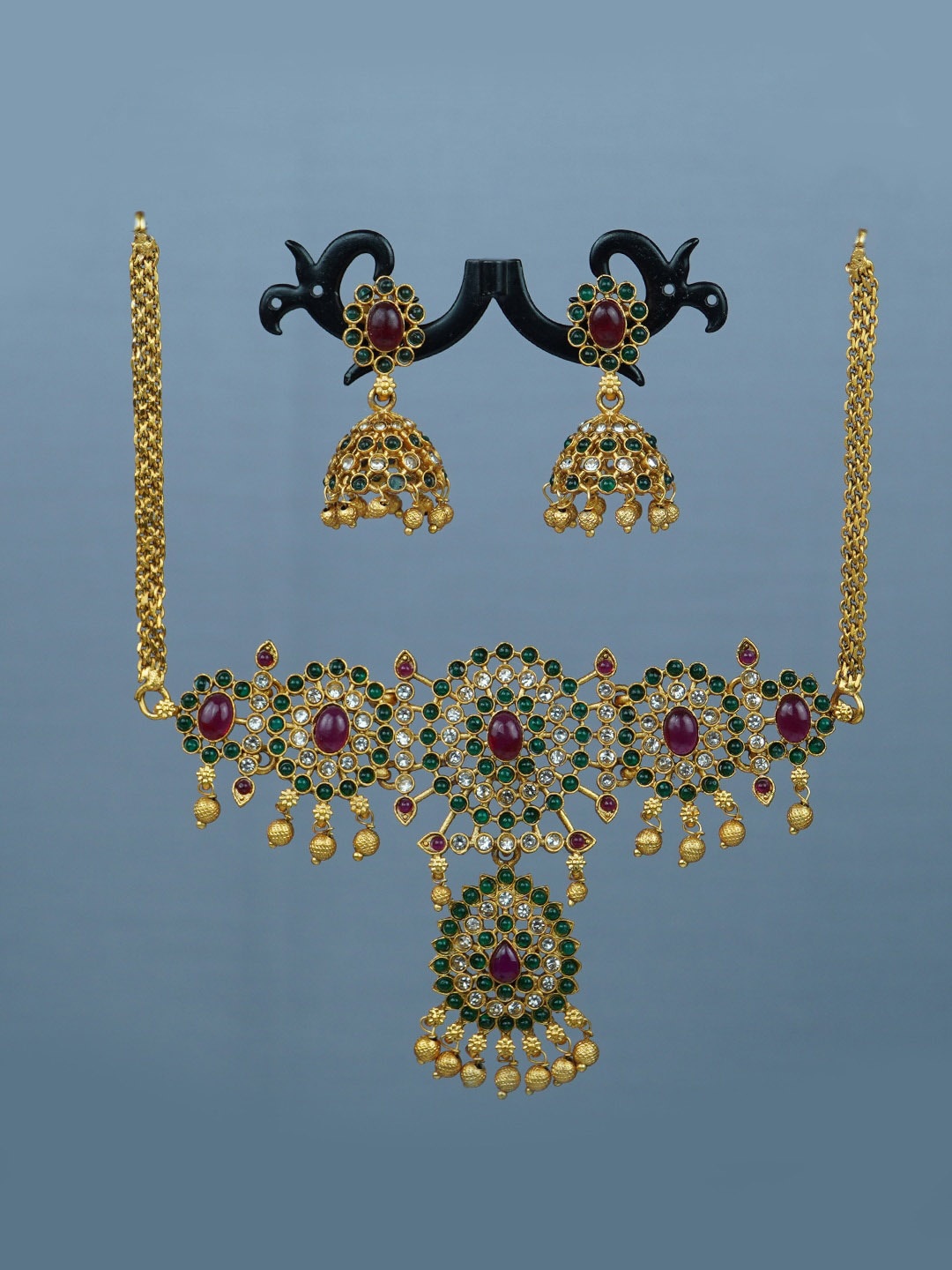 

Diksha collection Gold-Plated Stone-Studded & Beaded Matte Finish Jewellery Set