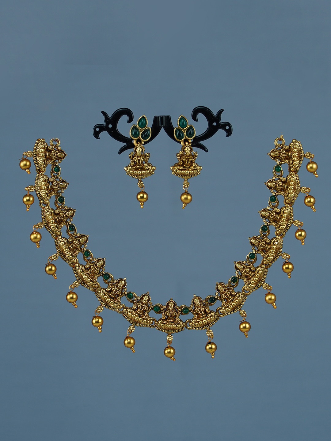 

Diksha collection Gold-Plated Stone-Studded & Beaded Matte Finish Jewellery Set