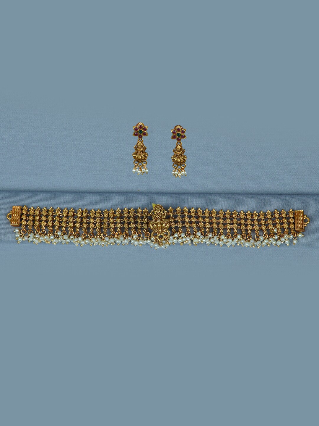 

Diksha collection Gold-Plated Stone-Studded & Beaded Matte Finish Jewellery Set