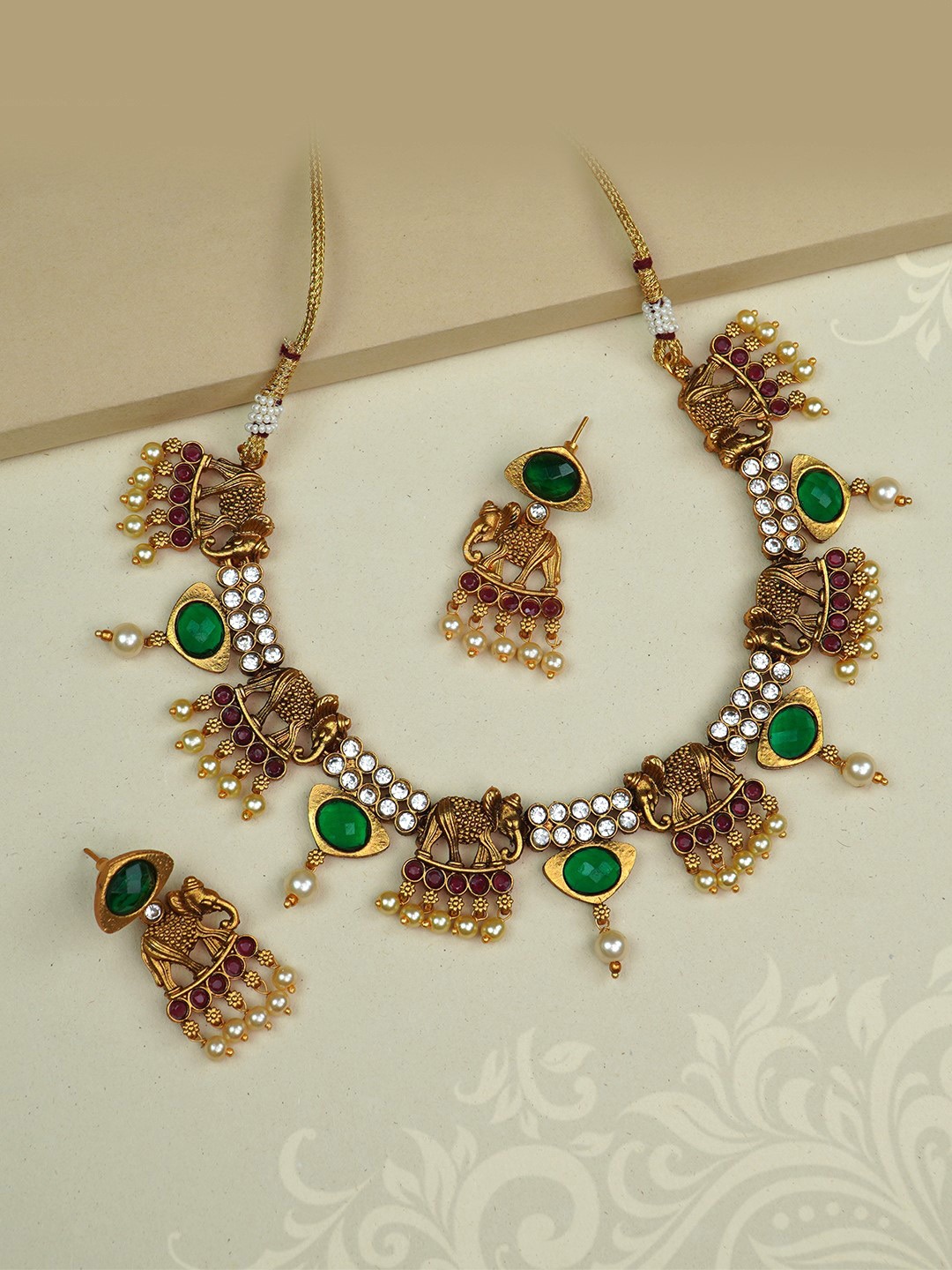 

Diksha collection Gold-Plated Stone Artificial Stones And Bead Jewellery Set