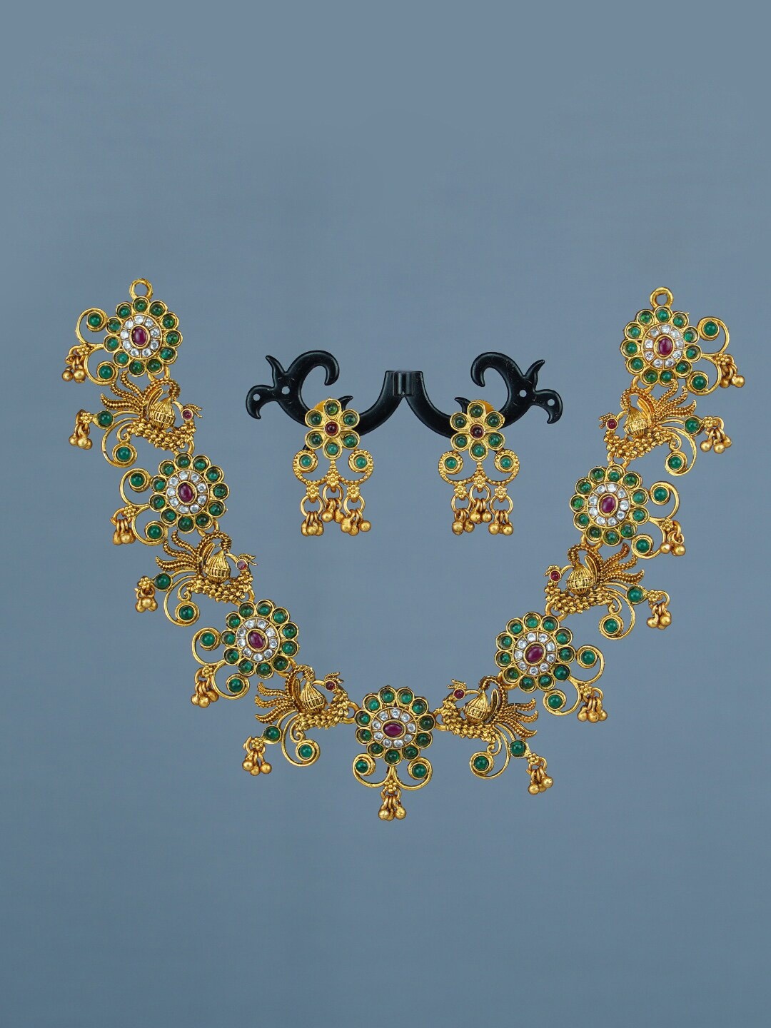 

Diksha collection Gold-Plated Stone-Studded Jewellery Set