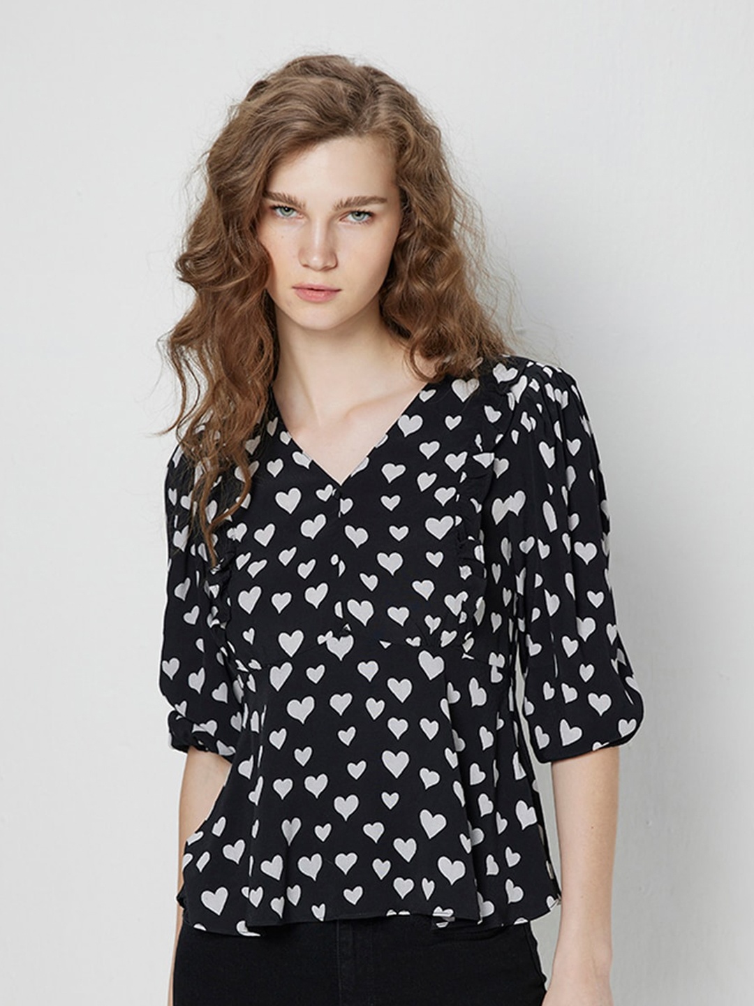 

COVER STORY Black & White Puff Sleeves Conversational Print Peplum Top