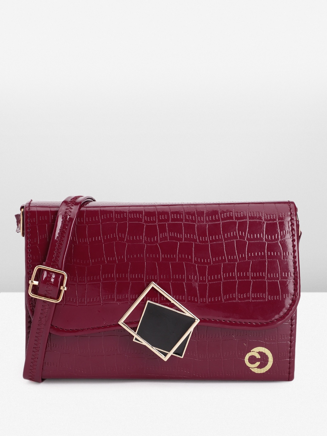 

Caprese Women Textured Sling Bag, Maroon