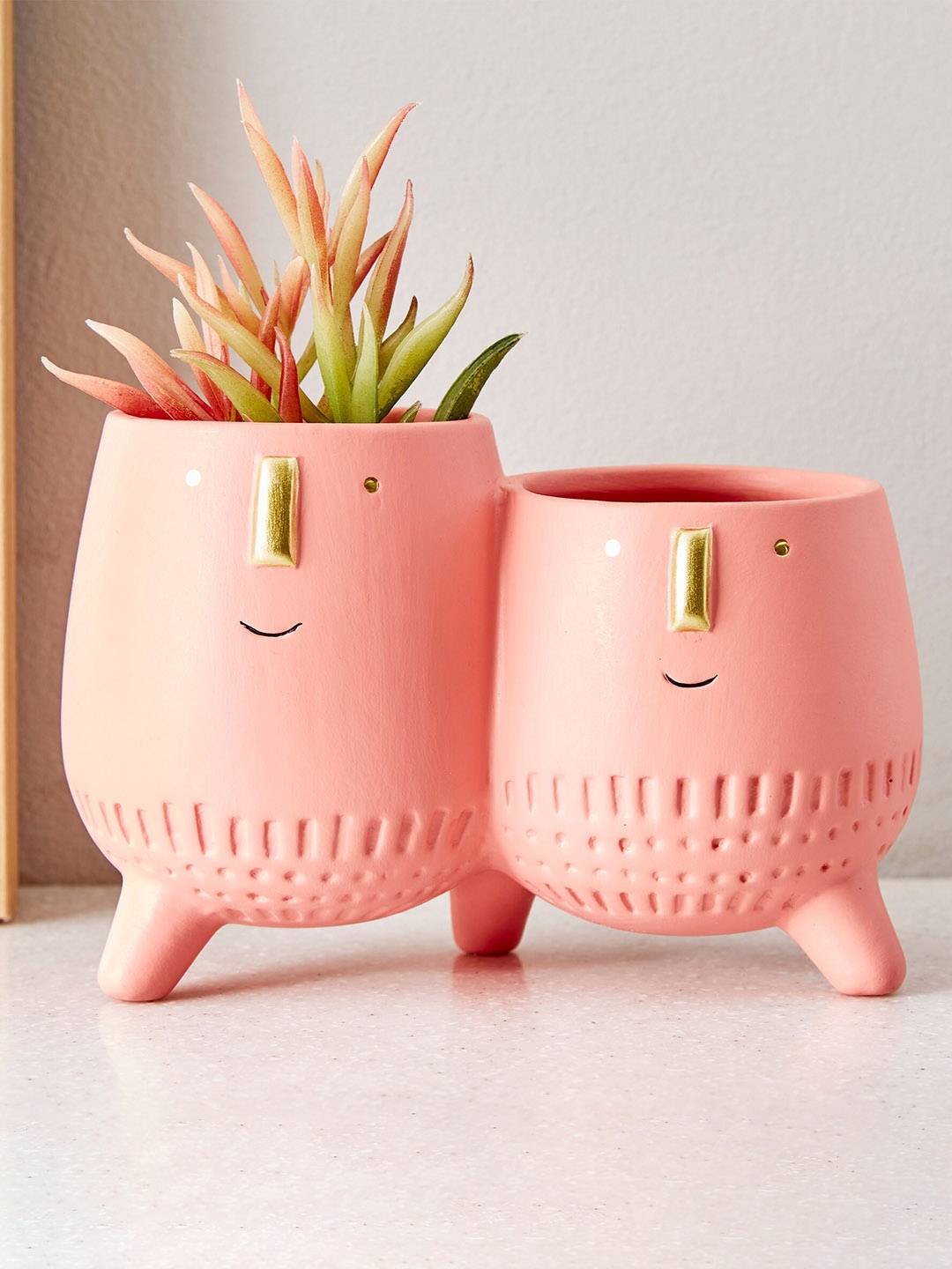 

Home Centre Hello Spring Peach-Colored Face-Shaped Ceramic Floor Planter