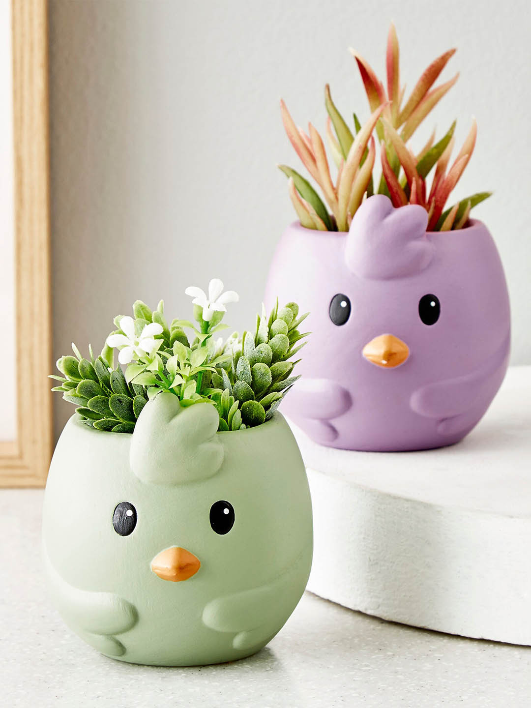 

Home Centre Spinel Decor Green Bird Shaped Ceramic Planter