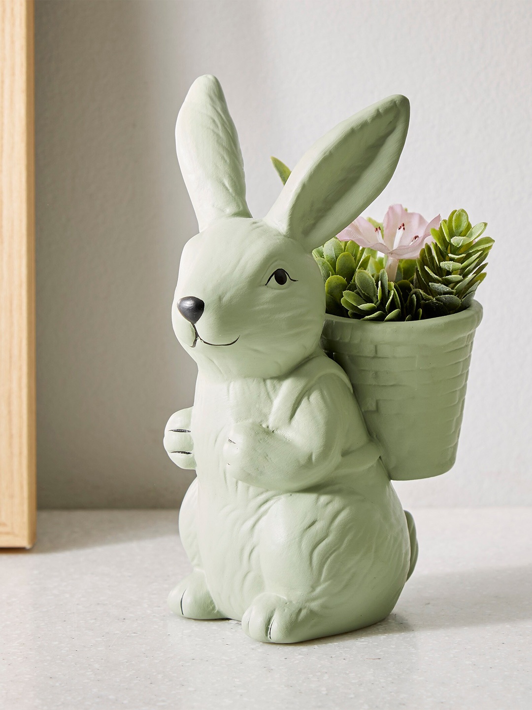 

Home Centre Gloria Green Textured Ceramic Rabbit Back Planter