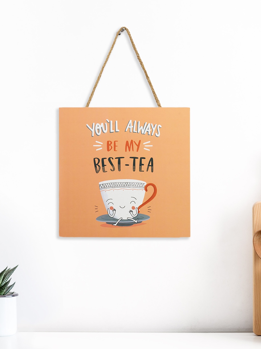 

Home Centre Garnet Interiors Orange-Coloured & White Wooden Printed Wall Hanging