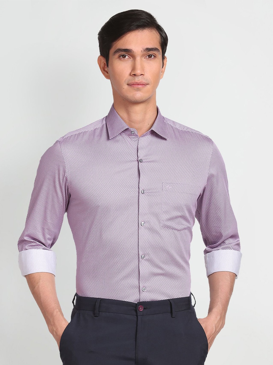

Arrow Men Self Design Pure Cotton Casual Shirt, Purple