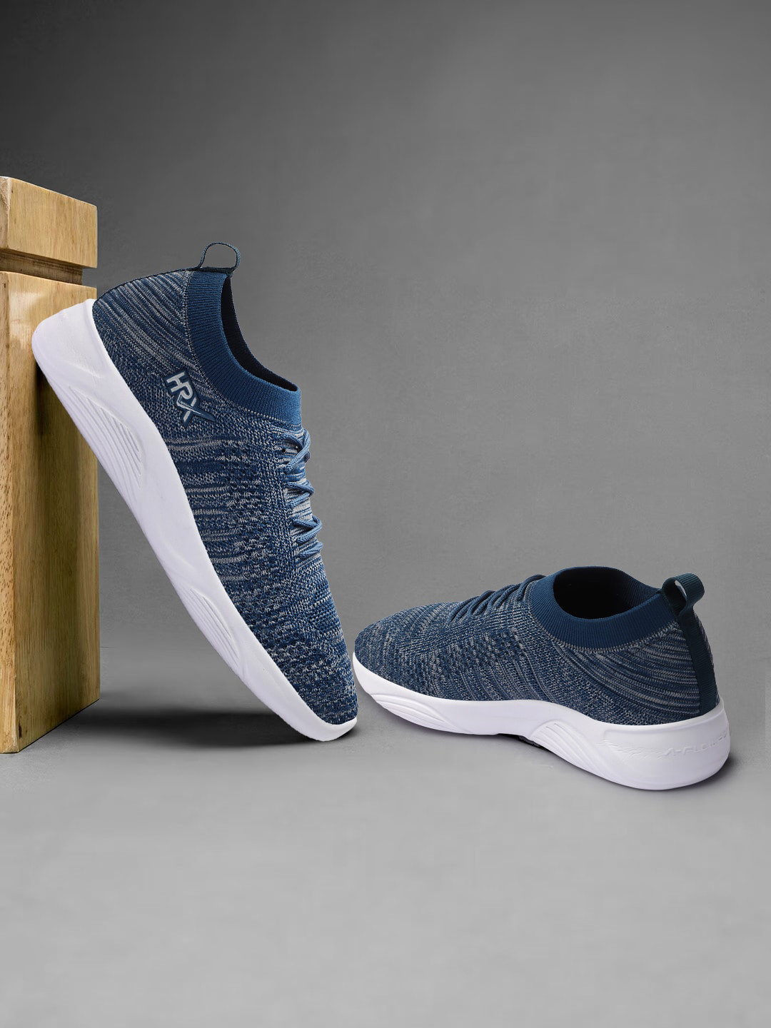 

HRX by Hrithik Roshan Men Navy Blue And White Woven Design Lightweight Slip-On Sneakers