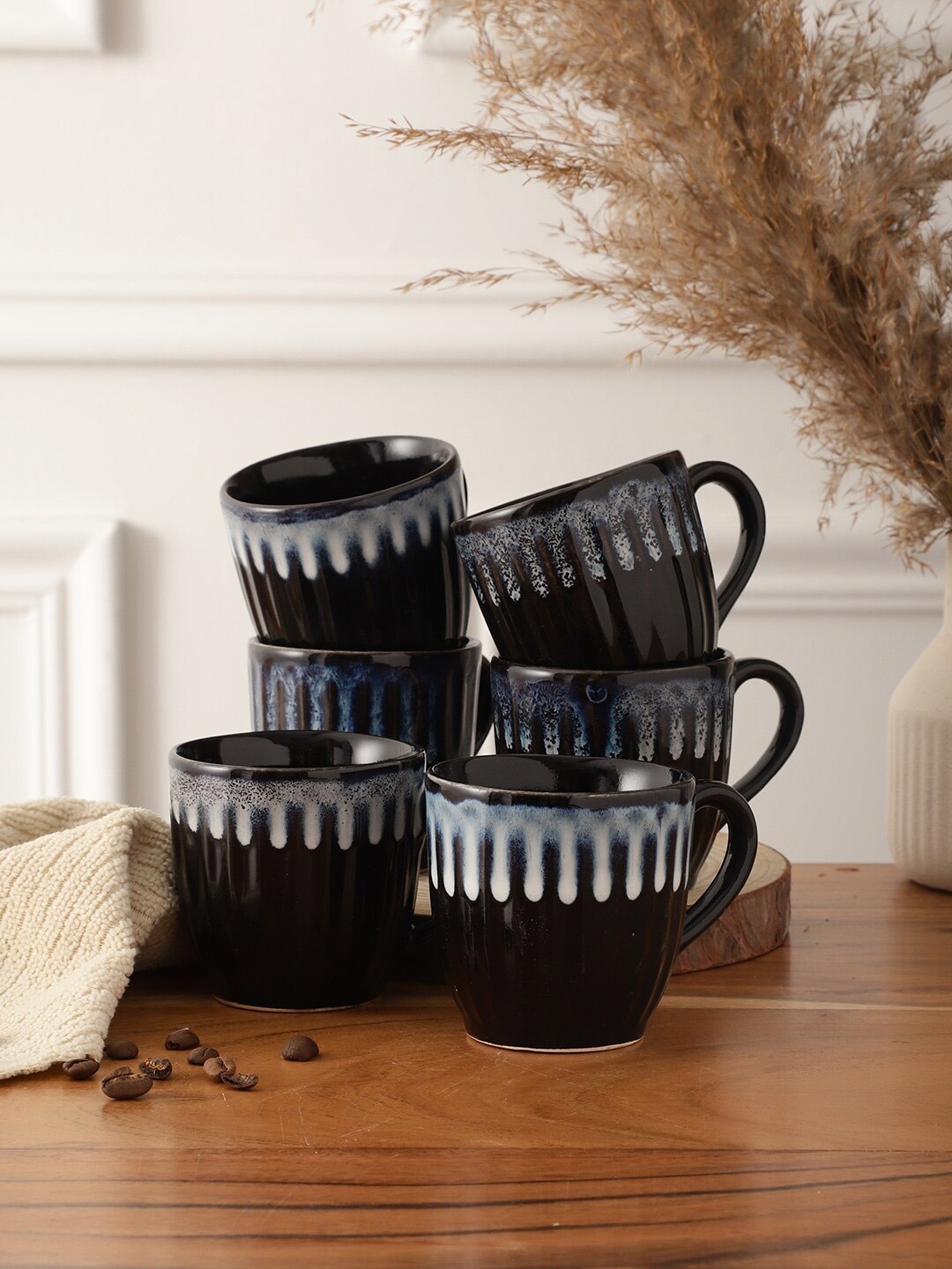 

CDI Black & White 6 Pieces Textured Karela Shaped Ceramic Glossy Cups - 180 ML Each