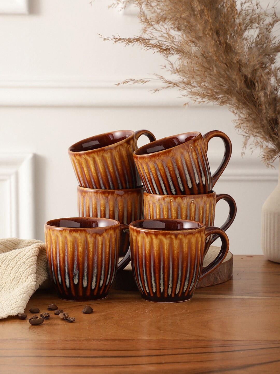 

CDI Brown 6 Pieces Textured Karela Shaped Ceramic Glossy Cups - 180 ML Each